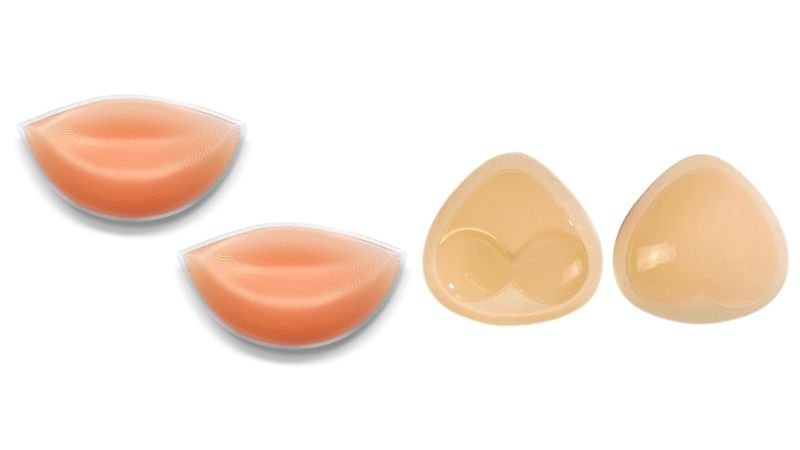 Silicone and fabric-covered foam breast enhancer inserts for bras and lingerie.