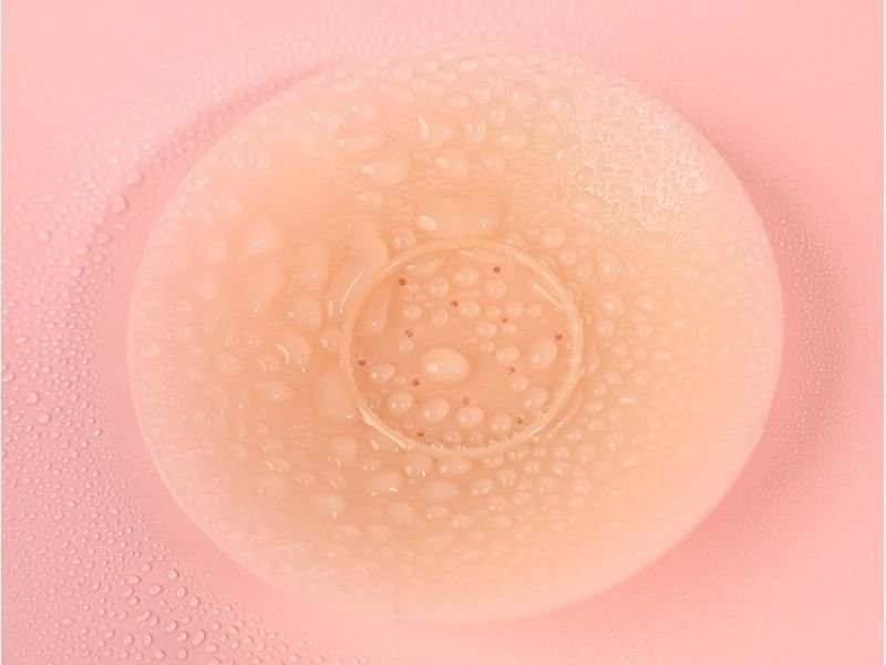 Silicone bra being tested for water resistance